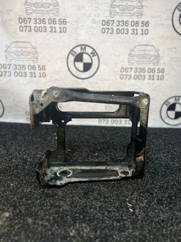 Кронштейн арки колеса (лонжерона) правий 51117399916 BMW