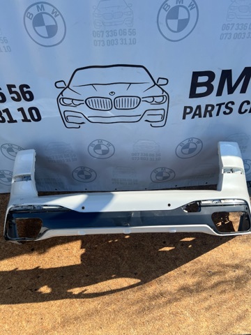 Кожух бампера заднього 51125A0BD60 BMW