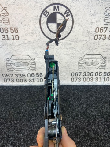 Замок дверей багажника 51247357112 BMW