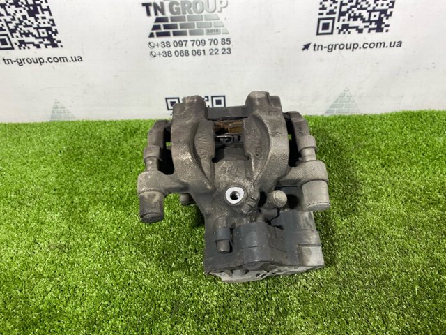 Супорт гальмівний задній правий 3Q0615424 VAG