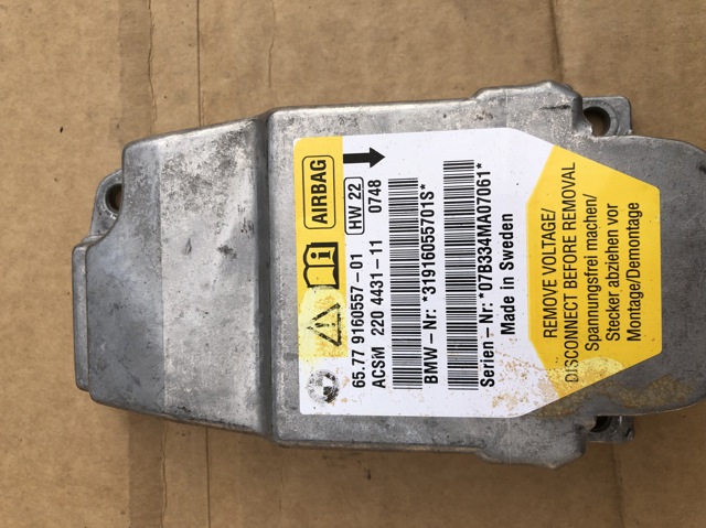 Блок управління airbag 65779160557 BMW