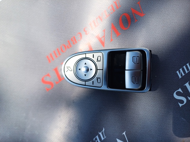 Кнопки переднього лівого склопід'ємника A2059057011 MERCEDES
