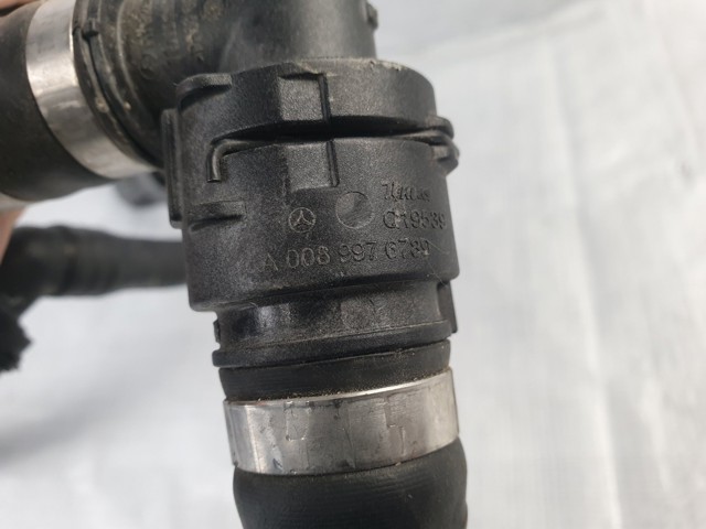 Патрубок системи охолодження A2975010900 MERCEDES
