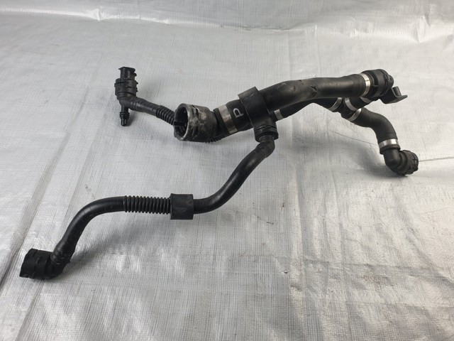 Патрубок системи охолодження A2975010900 MERCEDES
