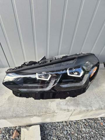 Блок фара ліва 63115A1FB11 BMW