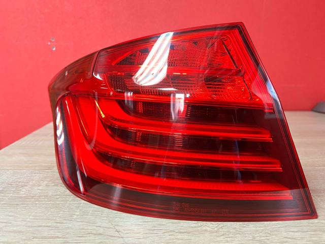 Задній лівий зовнішній ліхтар 63217312707 BMW