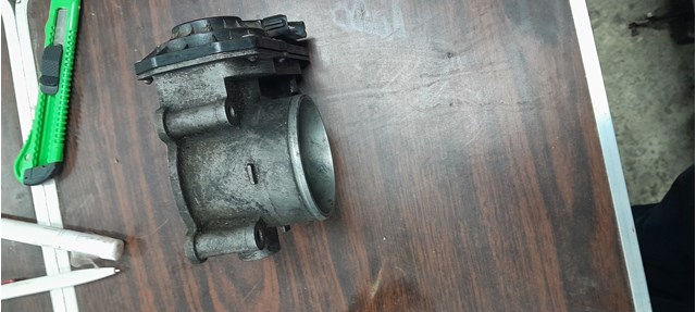 Блок дросельної заслінки 1450A033 MITSUBISHI