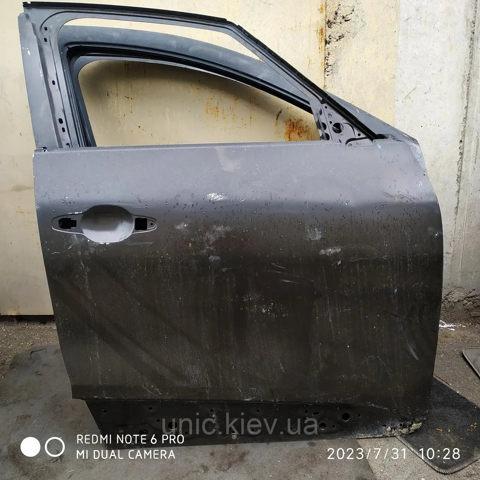 Дверка передня права 801004703R RENAULT