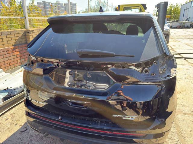 Спойлер задніх дверей FT4Z5844210AD FORD