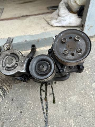Натягувач приводного ременя R2AA15980D MAZDA