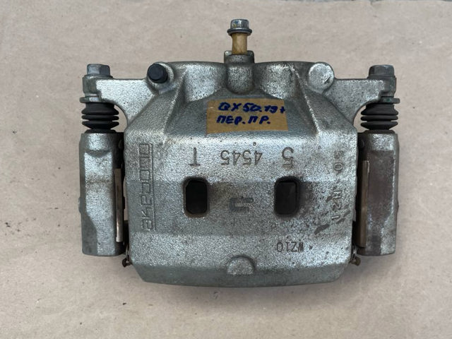 Супорт гальмівний, передній, правий 410014GS0B NISSAN