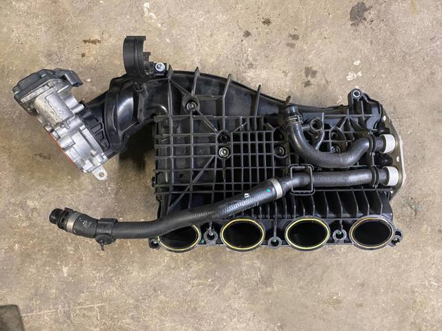 Блок дросельної заслінки 13548601651 BMW