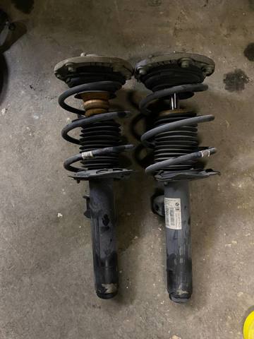 Амортизатор передньої підвіски 31316867448 BMW