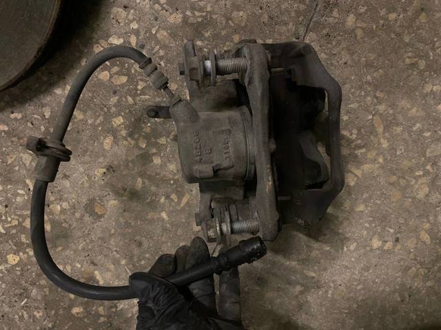 Супорт гальмівний задній правий 34206883034 BMW