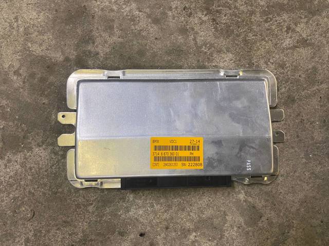 Блок керування пневмопідвіскою 37146870360 BMW