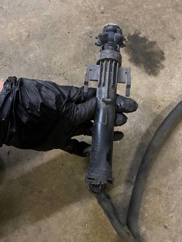 Сопло омивача фари передньої, лівої 61677275657 BMW