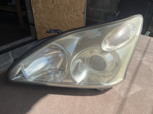 Фара ліва передня 811500E020 TOYOTA