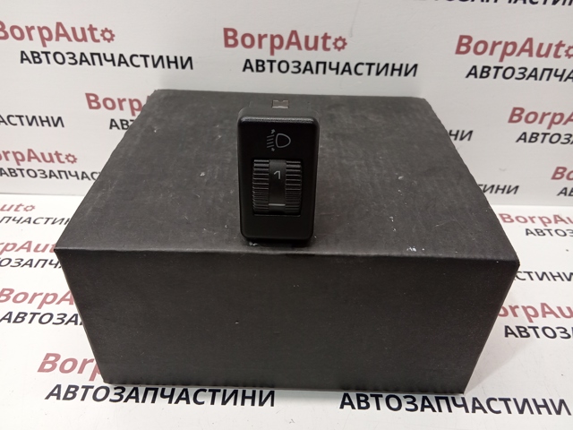 Кнопка коректора фар 357941333 VAG