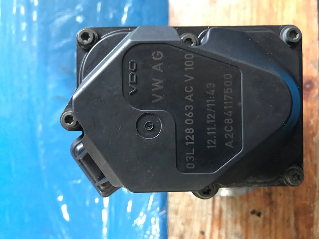 Дросільна заслінка в зборі 03L128063AC VAG