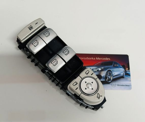 Кнопки переднього лівого склопід'ємника A2059056811 MERCEDES