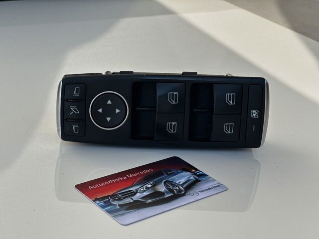 Кнопки переднього лівого склопід'ємника A2129056100 MERCEDES