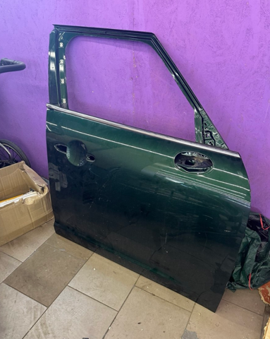 Пасажирські передні двері 41007438596 BMW