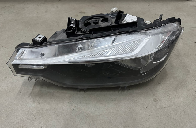 Фара ліва передня 63117338709 BMW
