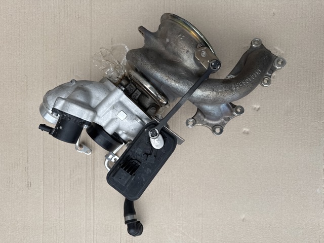 Турбокомпресор 11655A34710 BMW