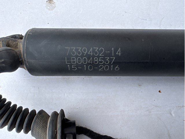 Амортизатор двері задньої 51247339432 BMW