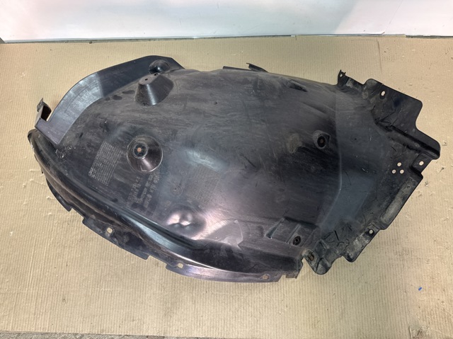 Підкрилок переднього крила, лівий задній 51717394815 BMW