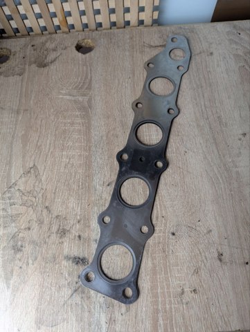 Прокладка випускного колектора 1555B029 MITSUBISHI