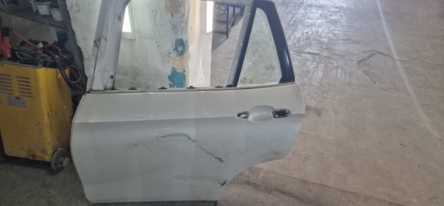 Двері пасажирськи задні ліві 41009628743 BMW