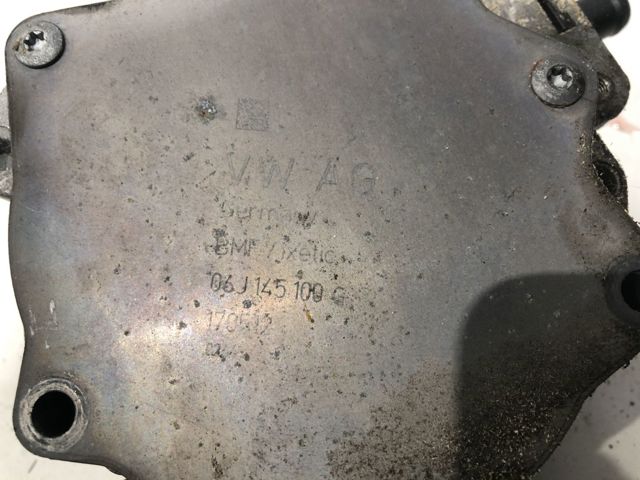 Насос вакуумний 06J145100G VAG
