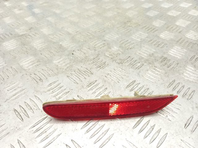 Лівий відбивач бампера 26565JJ90A NISSAN