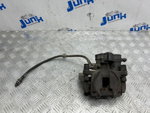 Задній гальмівний супорт лівий 26692AL03A SUBARU