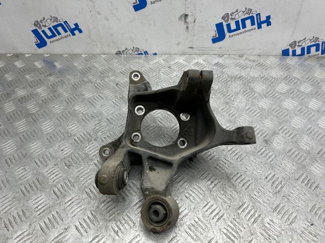 Цапфа поворотна ліва 28411AL03A SUBARU