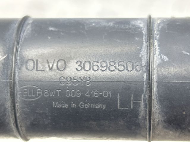 Форсунка омивача фари передньої, лівою 30698506 VOLVO