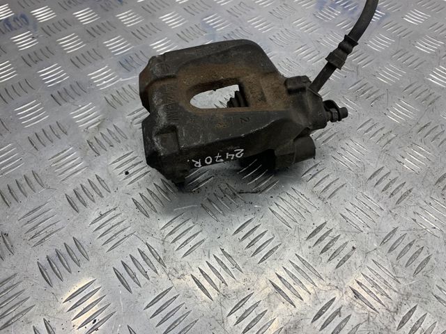 Супорт гальмівний задній правий 34216786832 BMW