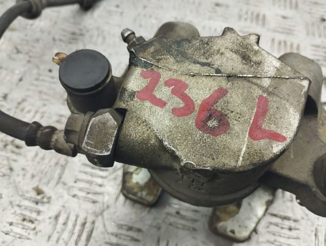 Супорт гальмівний, передній, лівий 36010012 VOLVO