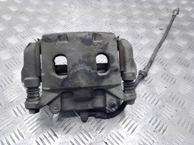 Супорт гальмівний, передній, правий 410013JA0C NISSAN