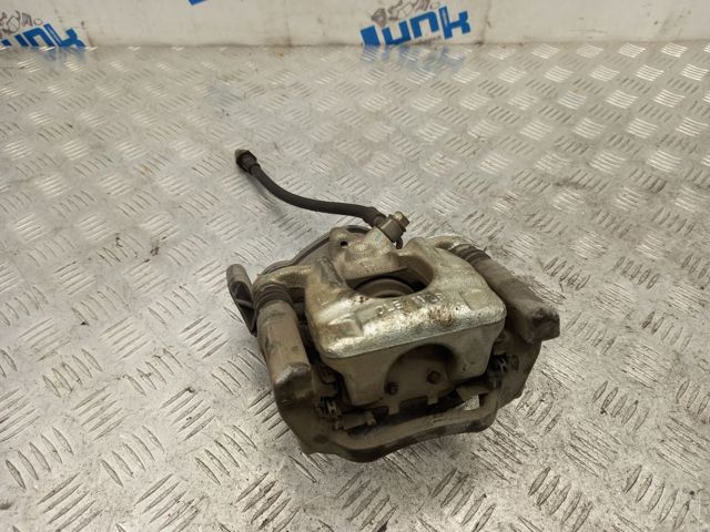 Задній гальмівний супорт лівий 440115NA0A NISSAN