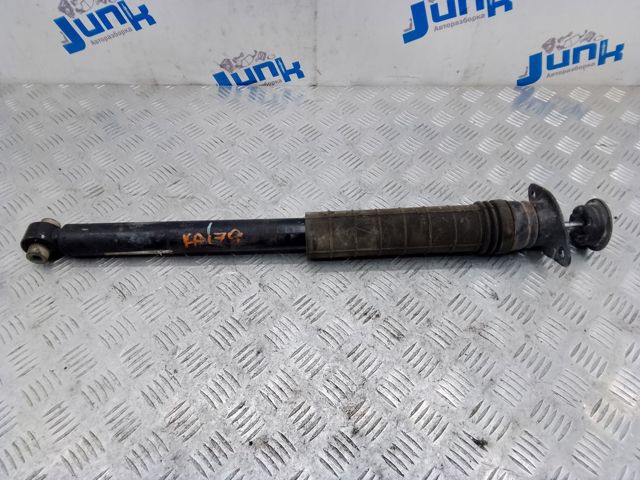 Стійка амортизатора задня 562105NA0E NISSAN