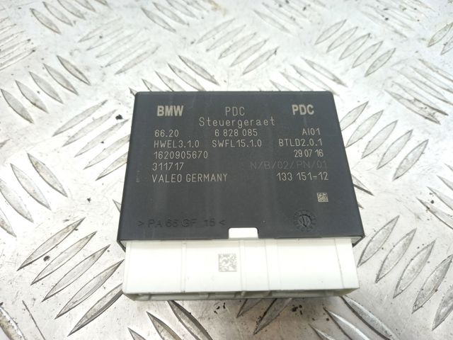 Модуль керування (ЕБУ) парктроніком 66335A02F95 BMW