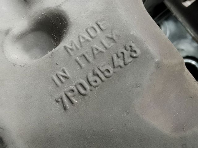 Задній гальмівний супорт лівий 7P6615423C VAG