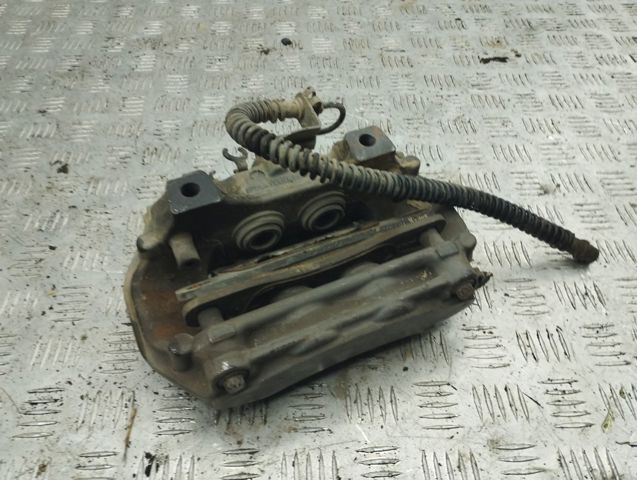 Супорт гальмівний задній правий 7P6615424C VAG
