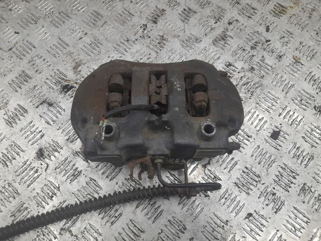 Супорт гальмівний задній правий 7P6615424D VAG