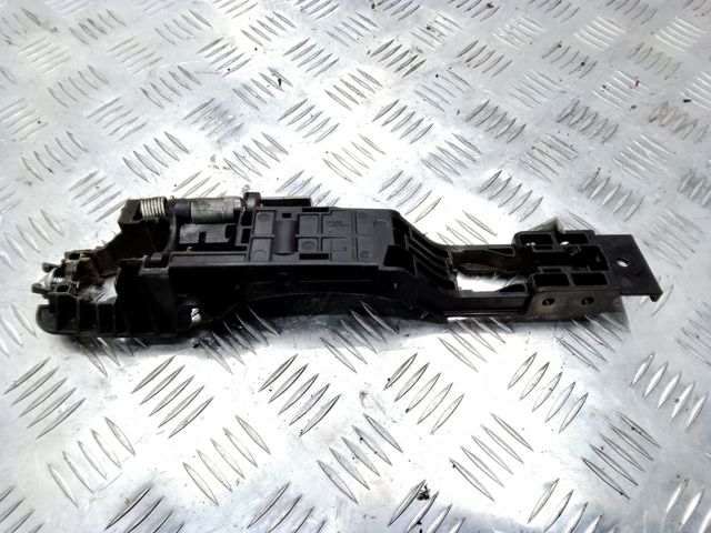Тримач зовнішньої ручки дверей, передньої лівої 806111AA0A NISSAN