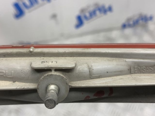 Лівий відбивач заднього бампера 84281SC010 SUBARU