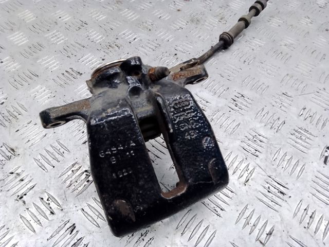Задній гальмівний супорт лівий 8K0615403D VAG