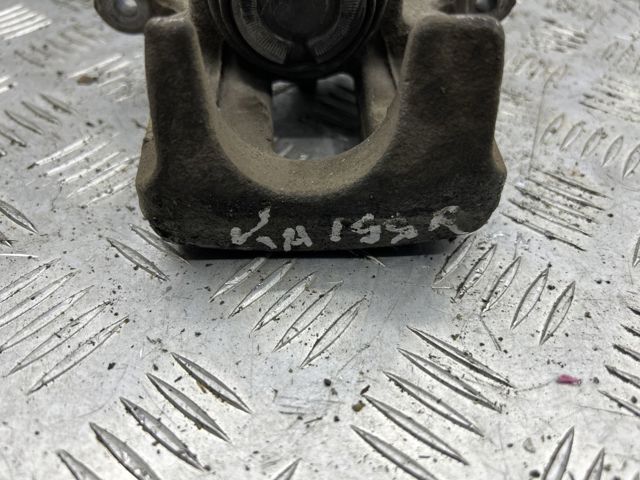 Супорт гальмівний задній правий 8U0615404B VAG